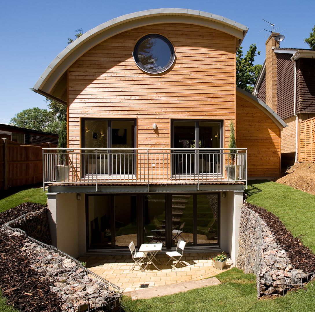Timber Clad Passive House with Curved Roof, haus ltd haus ltd Rumah: Ide desain interior, inspirasi & gambar