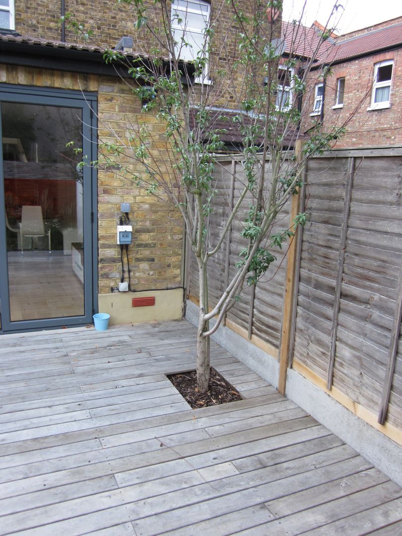 Modern Family garden in North London, Earth Designs Earth Designs حديقة