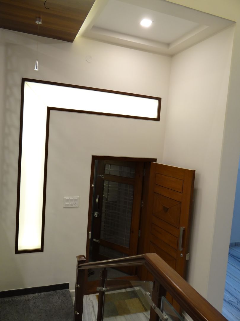 The Entrance Door - witha backlit window homify Modern corridor, hallway & stairs