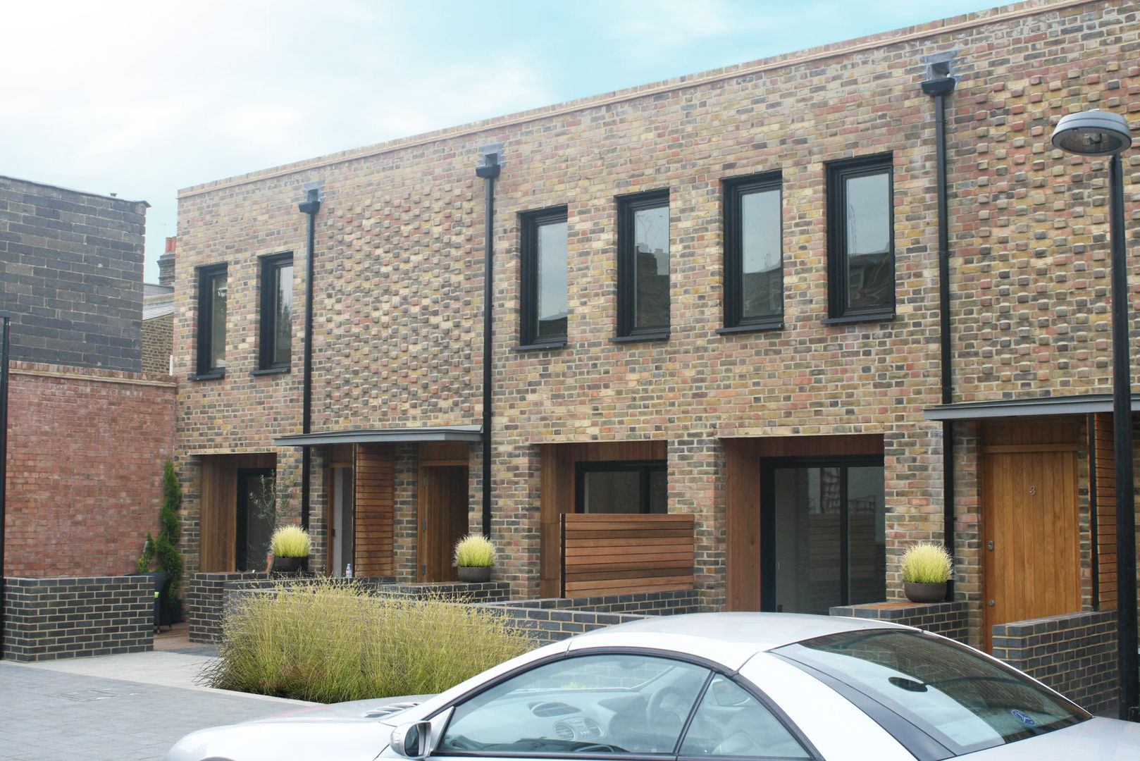 Eden Studios: 7 new houses in west London, Studiodare Architects Studiodare Architects Casas modernas