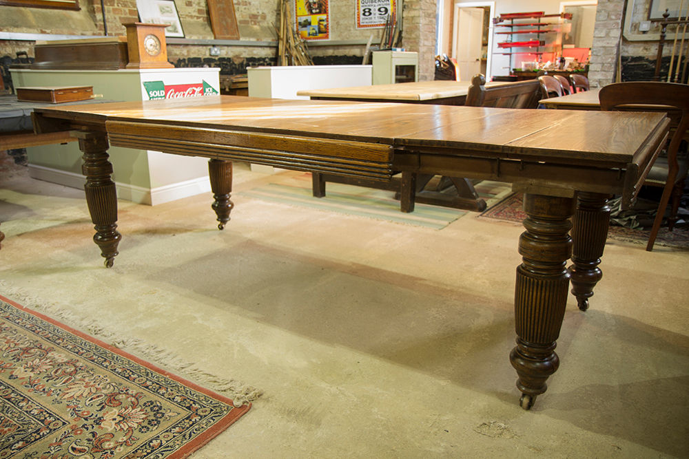 Antique extending oak dining table Brown's Antiques Billiards and Interiors Столовая комната в классическом стиле Столы