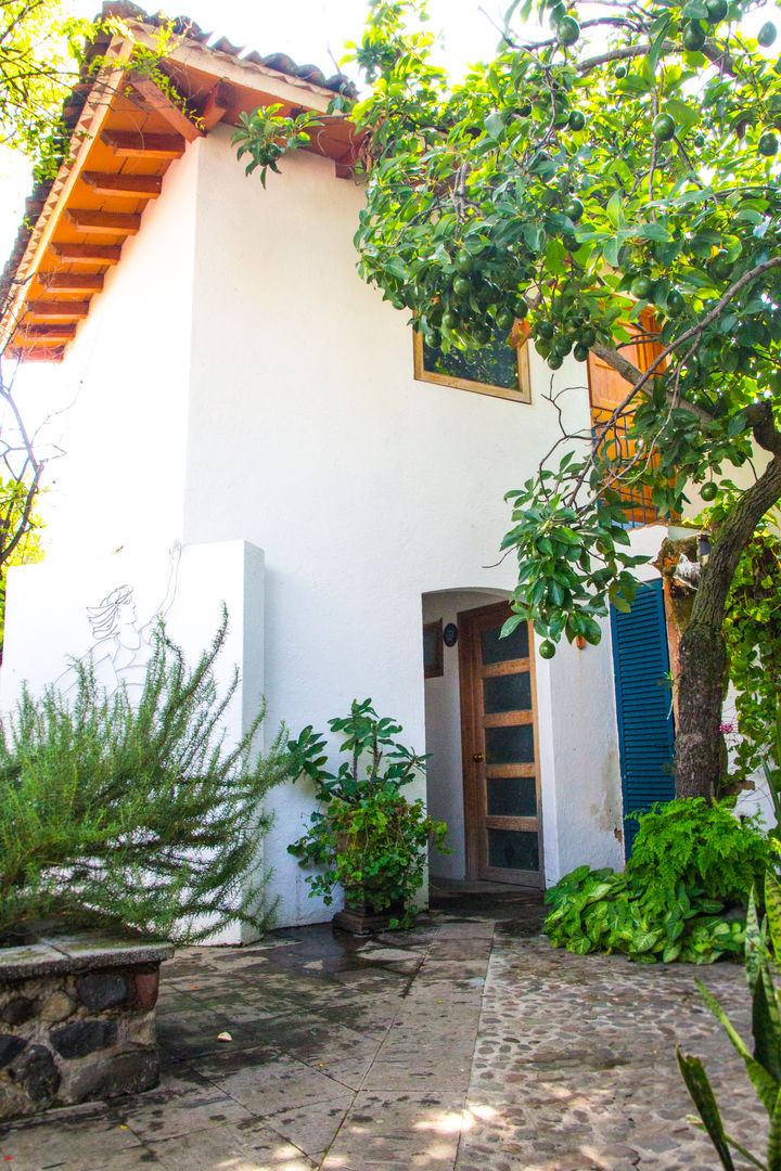 Casa de descanso en Chapala, Mikkael Kreis Architects Mikkael Kreis Architects สวน