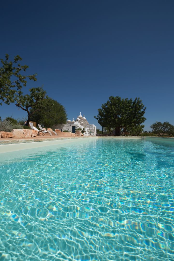 Realizzazione privata Piscine Castiglione con Tecnologia Bluestyle , PISCINE CASTIGLIONE PISCINE CASTIGLIONE Rustic style pool Pool