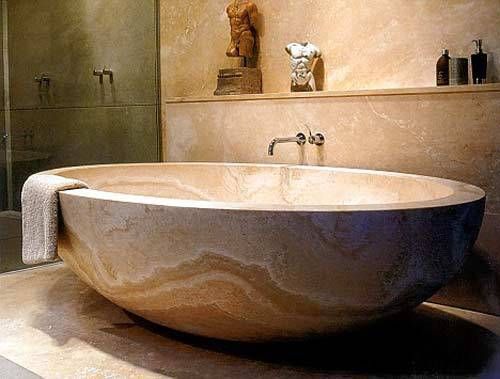 Stone bath tub Anzalna Trading Company Casas de banho campestres Banheiras e duches