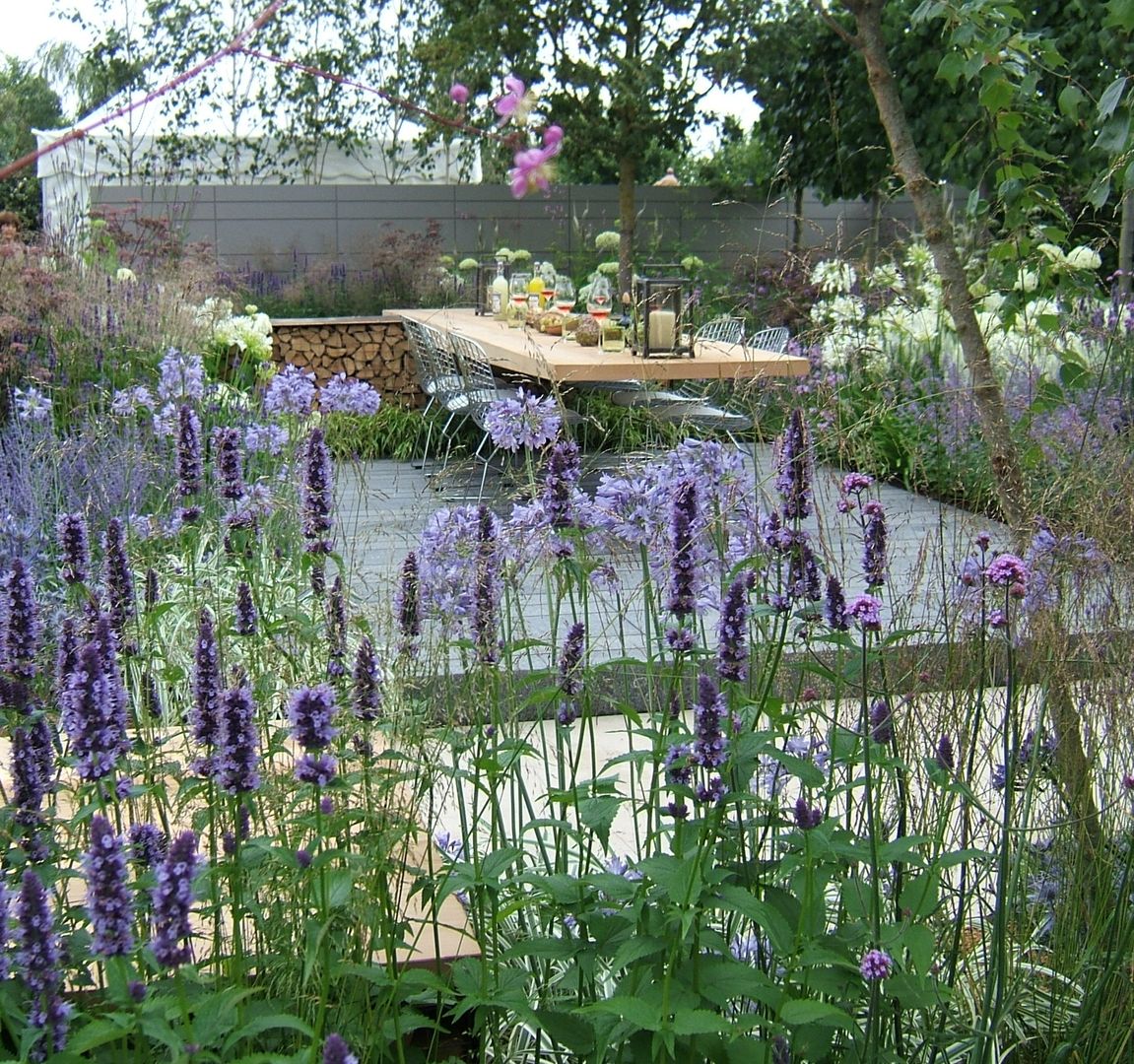Make the most of your garden. It can act as an outdoor room. Perfect Plants Ltd Country style garden
