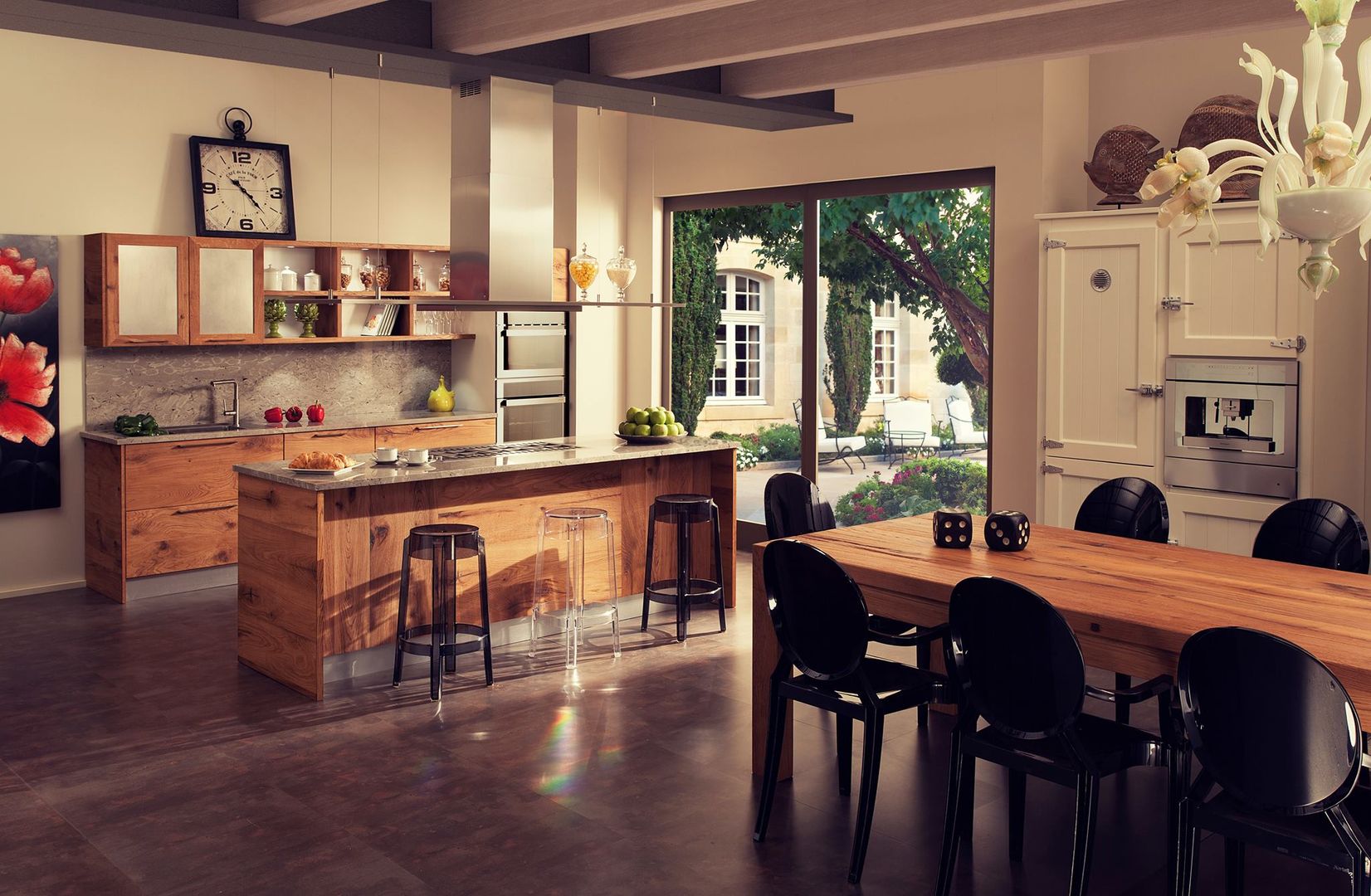 Cucina a pianta aperta e zona pranzo con tavolo, bar per la prima colazione  e l'isola centrale Foto stock - Alamy