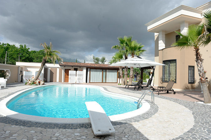 villa monofamiliare con piscina, architecture and design architecture and design Piscine Piscine