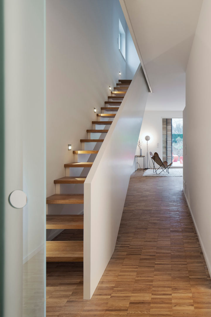 homify Modern corridor, hallway & stairs