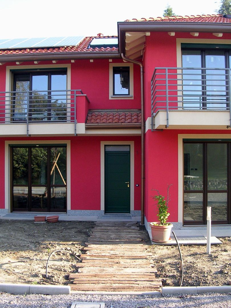 Abitazione bifamiliare con struttura in legno (classe energetica A+), Arch. Dario Nespoli Arch. Dario Nespoli منازل