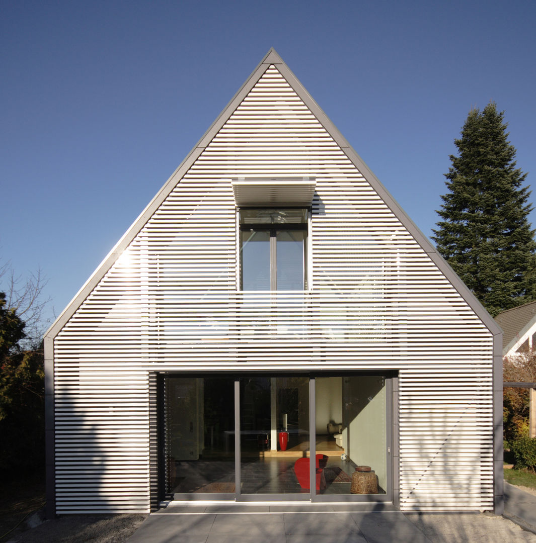 Anbau und Sanierung eines Wohnhauses, Haack + Höpfner . Architekten und Stadtplaner BDA Haack + Höpfner . Architekten und Stadtplaner BDA Salas de estilo moderno