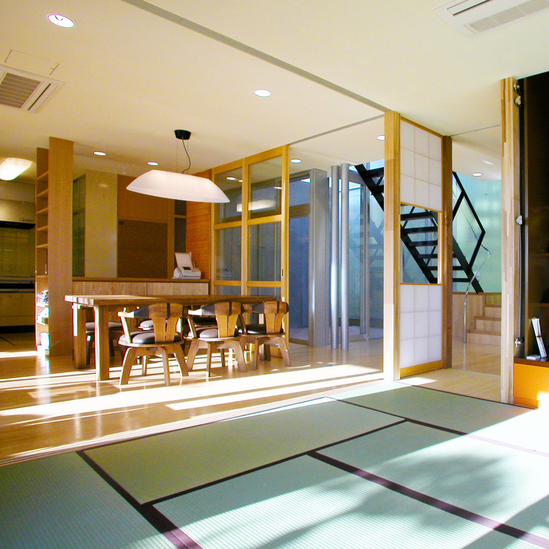 花壇の家/3世代住宅, ユミラ建築設計室 ユミラ建築設計室 Salas de estilo moderno