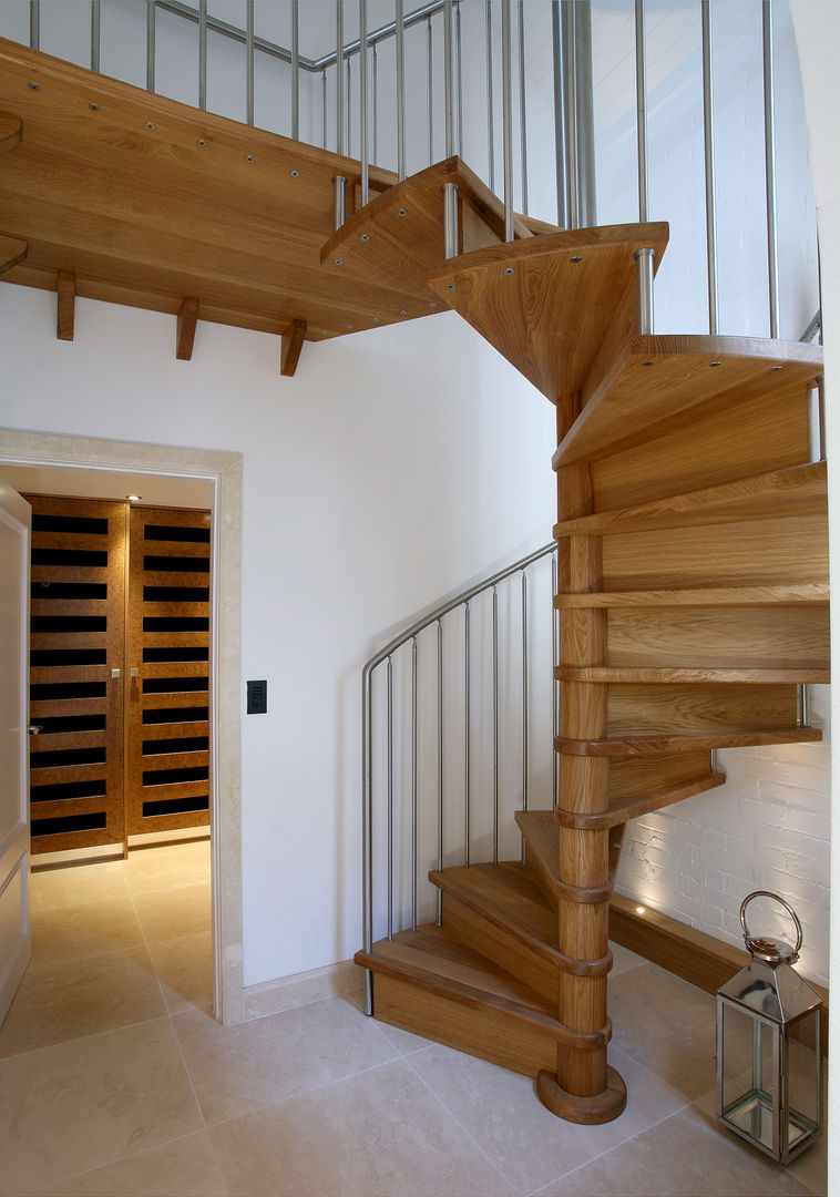 New spiral staircase to guest wing Angel Martin Interiors