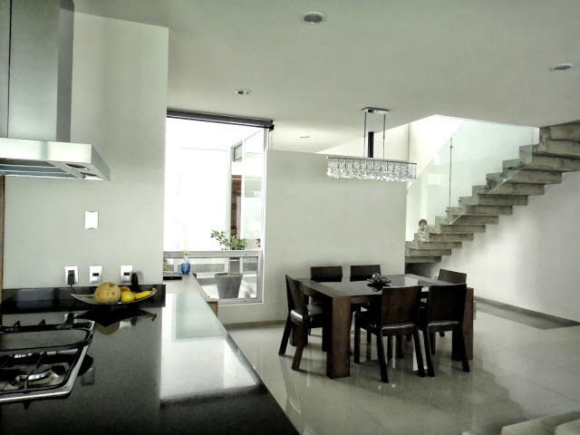 Casa Zaragoza, Abraham Cota Paredes Arquitecto Abraham Cota Paredes Arquitecto Modern Dining Room