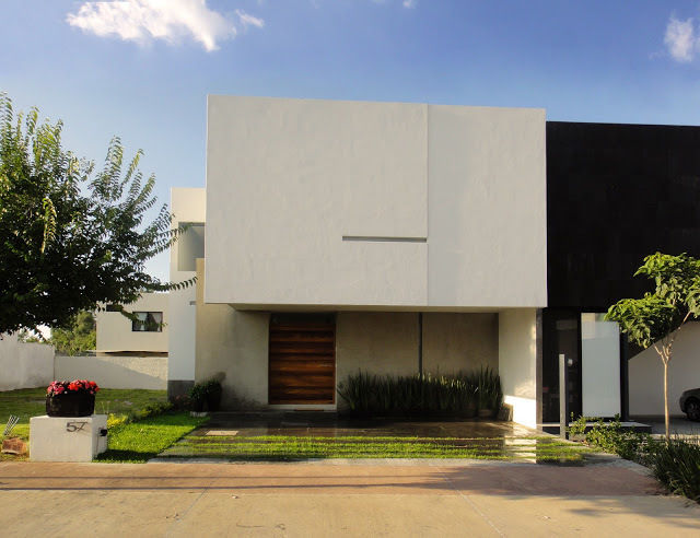 Casa Zaragoza, Abraham Cota Paredes Arquitecto Abraham Cota Paredes Arquitecto Дома в стиле модерн