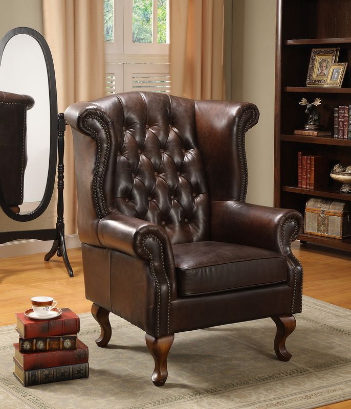 Chesterfield Back Leather Armchair Locus Habitat Salas de estilo clásico Sofás y sillones