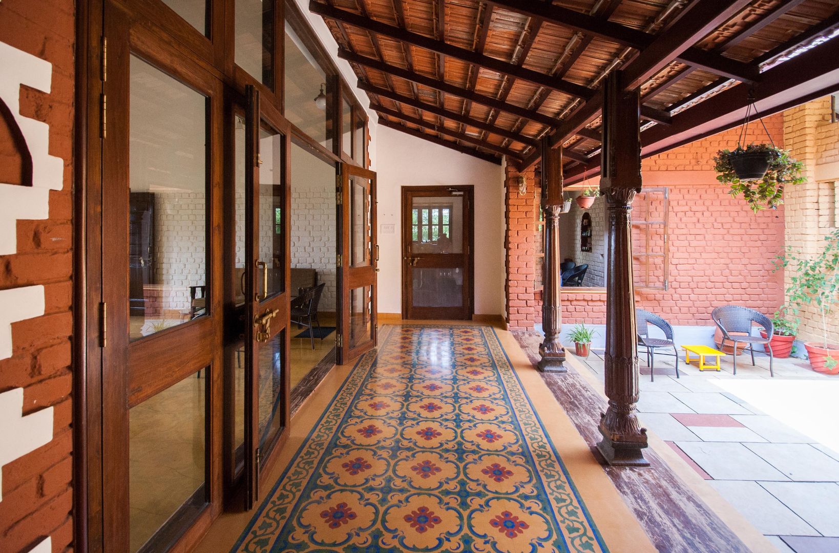 The verandah M+P Architects Collaborative Balcony Property,Plant,Door,Window,Building,Picture frame,Wood,Houseplant,Interior design,Flooring