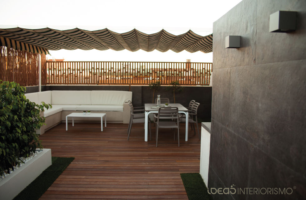 Terraza de diseño en Catarroja, Valencia, Ideas Interiorismo Exclusivo, SLU Ideas Interiorismo Exclusivo, SLU Varandas, alpendres e terraços mediterrâneo