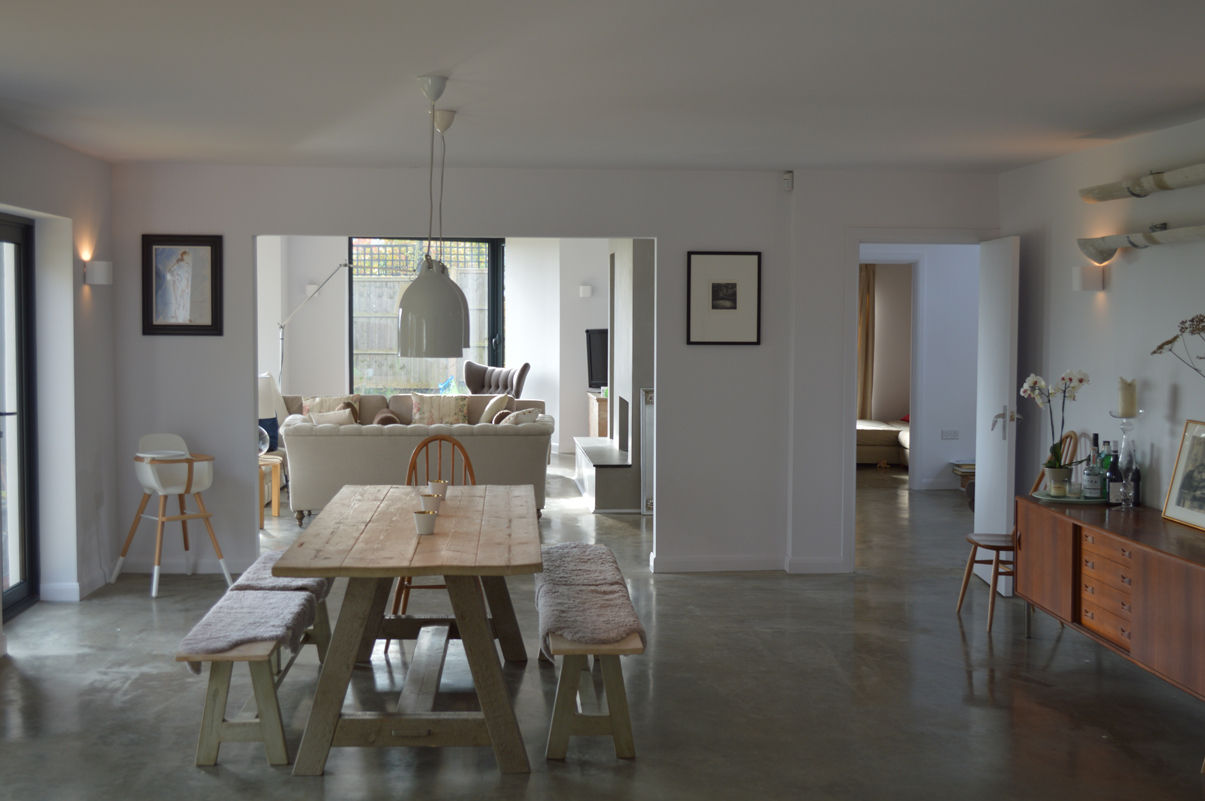 Open plan living on ground floor: modern by ArchitectureLIVE, Modern open space kitchen,open plan living,dining table,dining room,living room,polished concrete,concrete flooring