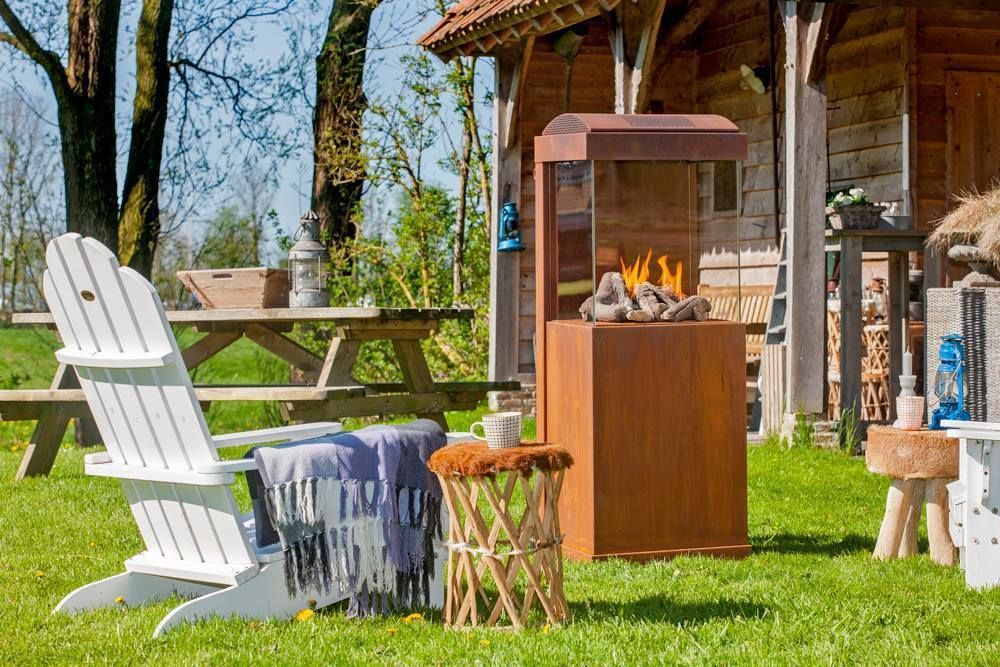 Stile & Warm Design - Outdoor by DIM'ORA, Dim-ora Caminetti su misura a gas, elettrici e a bioetanolo Dim-ora Caminetti su misura a gas, elettrici e a bioetanolo بلكونة أو شرفة إضاءة