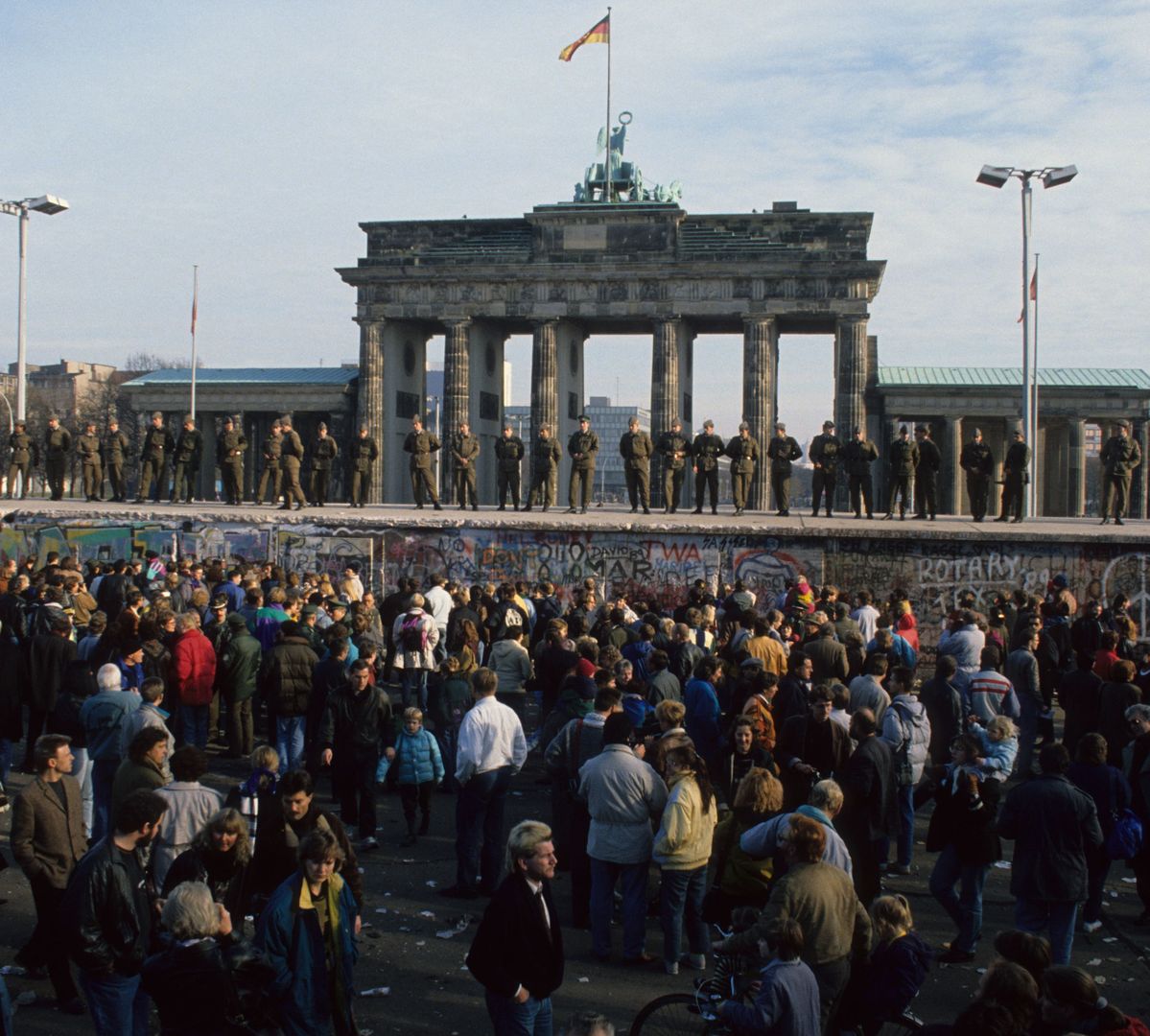 Berlin Wall by Brandenburg Gate, 11/11/1989: Berlin after the opening of the Wall on November 11, 1989, view of Brandenburg Gate and crowds homify