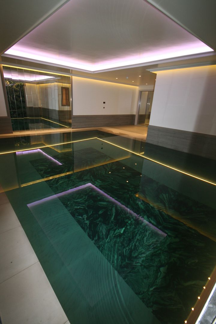 Indoor subterranean pool with movable floor, Tanby Pools Tanby Pools مسبح