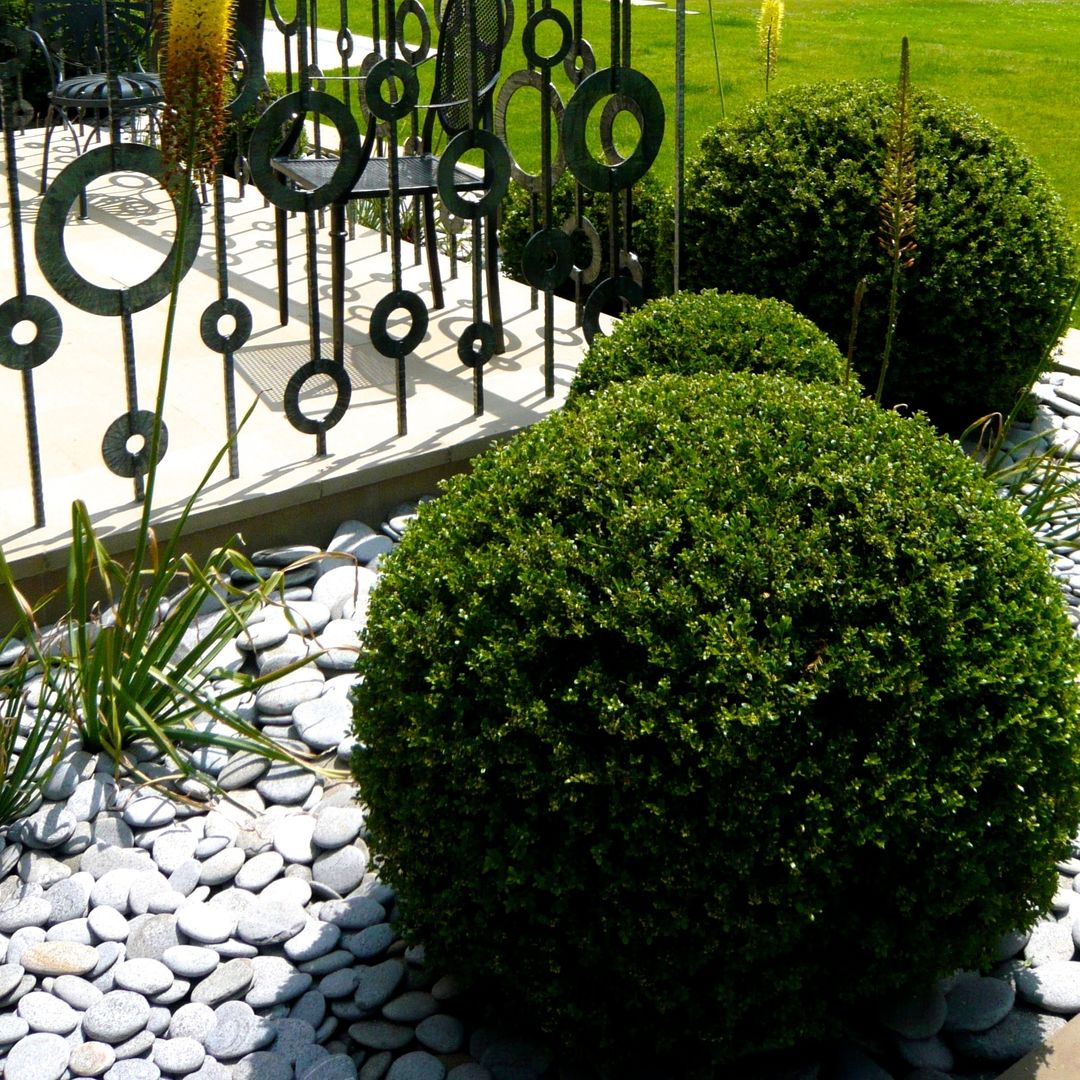Topiary balls & bespoke railing for contemporary styling Joanne Alderson Design