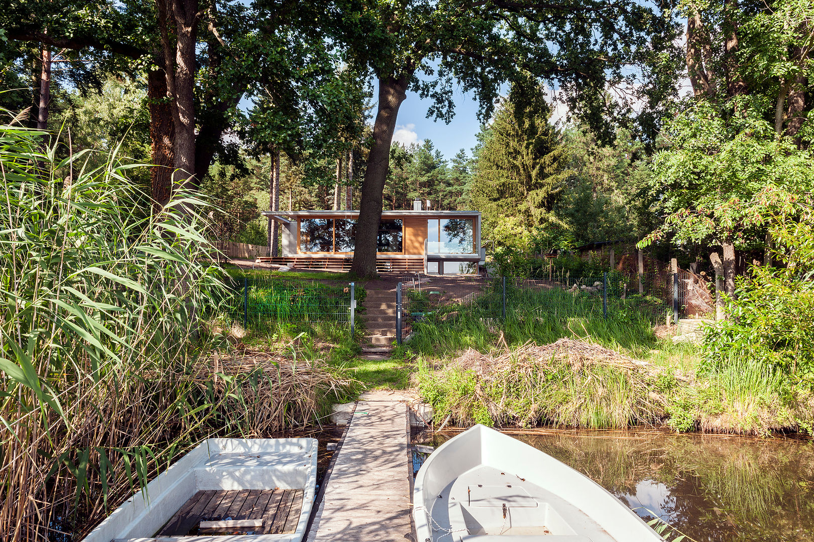 Wochenendhaus am Lübbesee, arcs architekten arcs architekten Casas modernas: Ideas, diseños y decoración