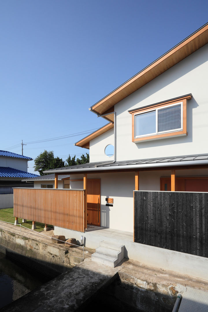 疏水の見える書斎のある家, ATELIER TAMA ATELIER TAMA Eclectic style houses