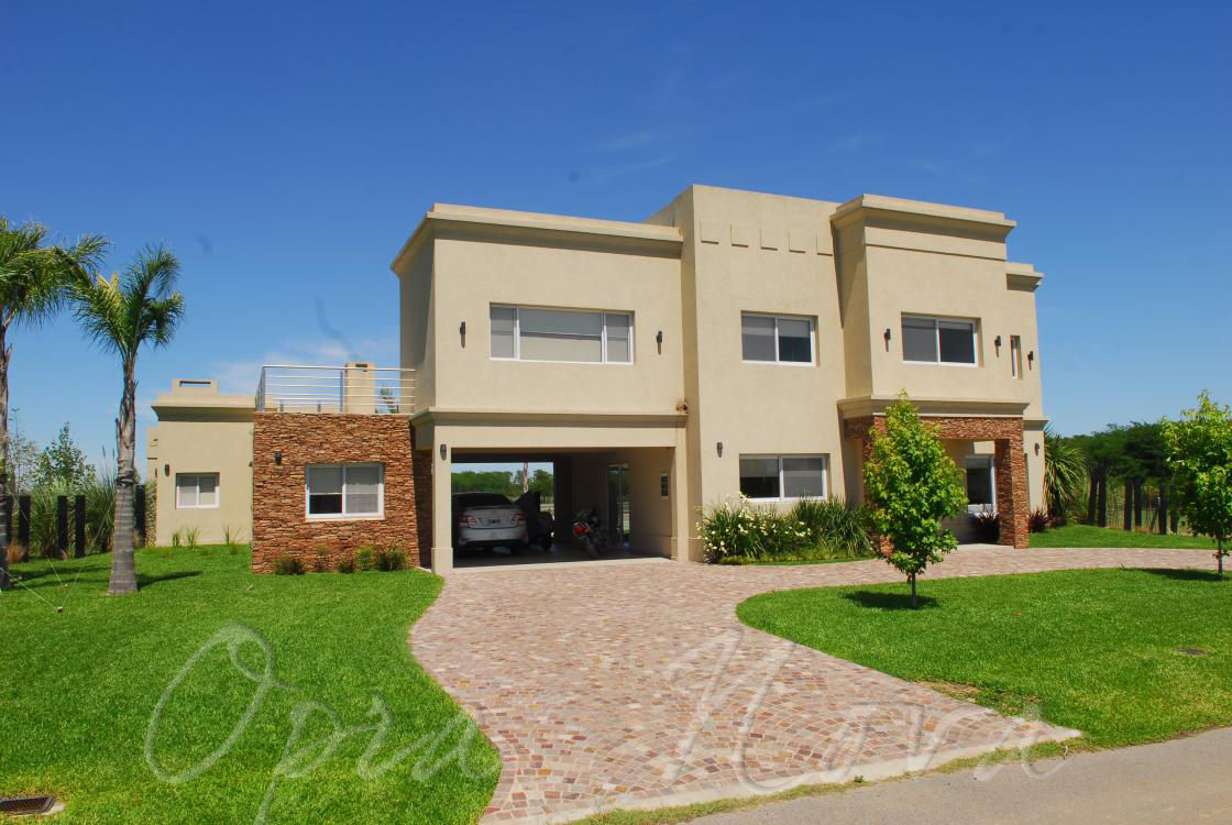 Casa Estilo Racionalista Clásica en Luján, Opra Nova - Arquitectos - Buenos Aires - Zona Oeste Opra Nova - Arquitectos - Buenos Aires - Zona Oeste Дома в стиле модерн