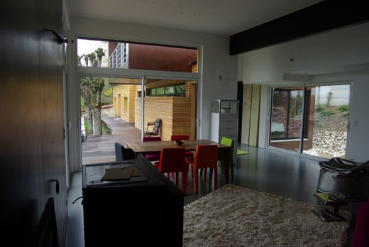 Le séjour, vue vers la terrasse sud Atelier d'Architecture Marc Lafagne, architecte dplg Maisons modernes