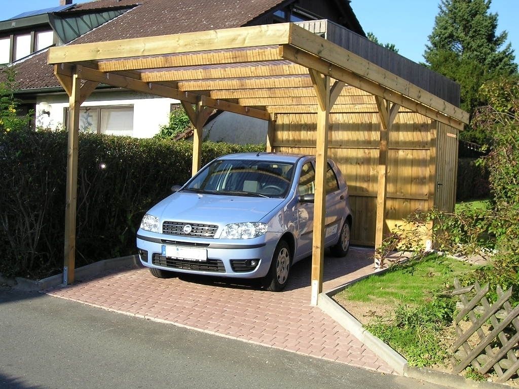 Carport-Discount.de - günstige Holzcarports als Bausatz online konfigurieren, Deutsche Carportfabrik GmbH & Co. KG Deutsche Carportfabrik GmbH & Co. KG Rustic style garage/shed Garages & sheds