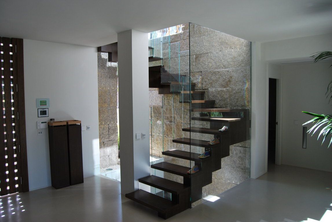 Escalera saz arquitectos Casas modernas