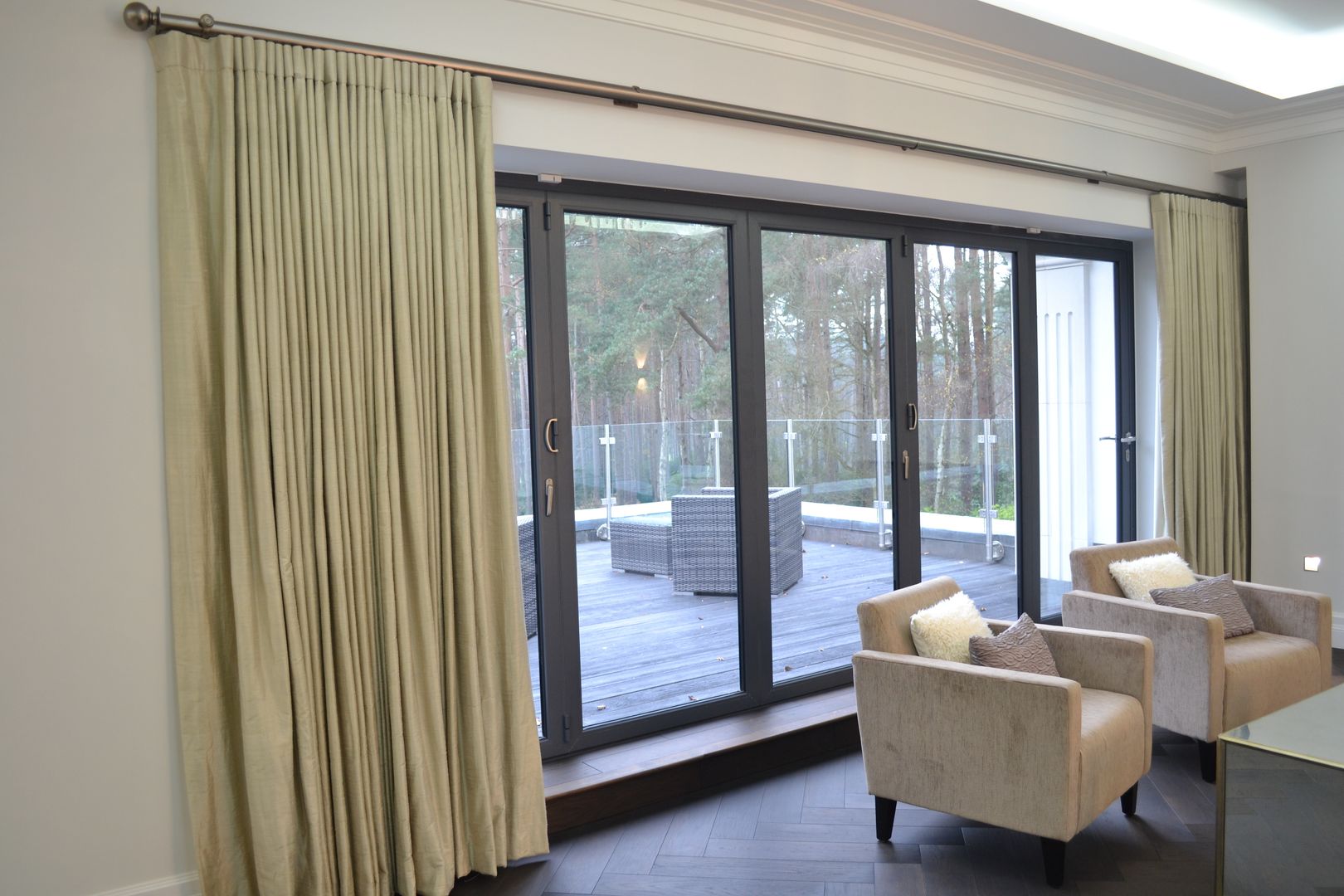 Large Tracked Pole with Wave Curtains International Soft Furnishers Modern windows & doors Curtains & drapes