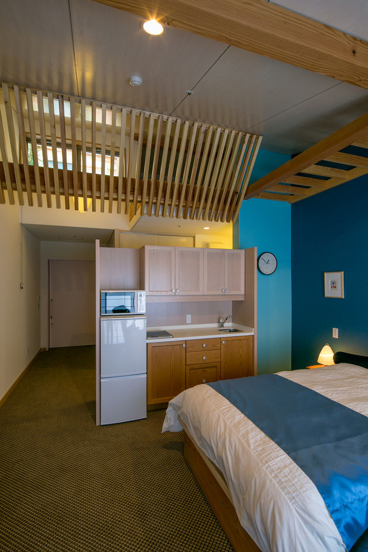 シングルの住室 有限会社加々美明建築設計室 オリジナルスタイルの 寝室