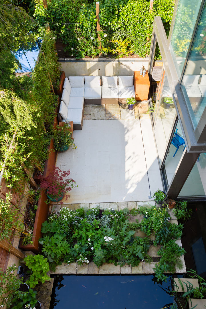 Green Retrofit, Lambourn Road, Granit Architects Granit Architects Modern Garden