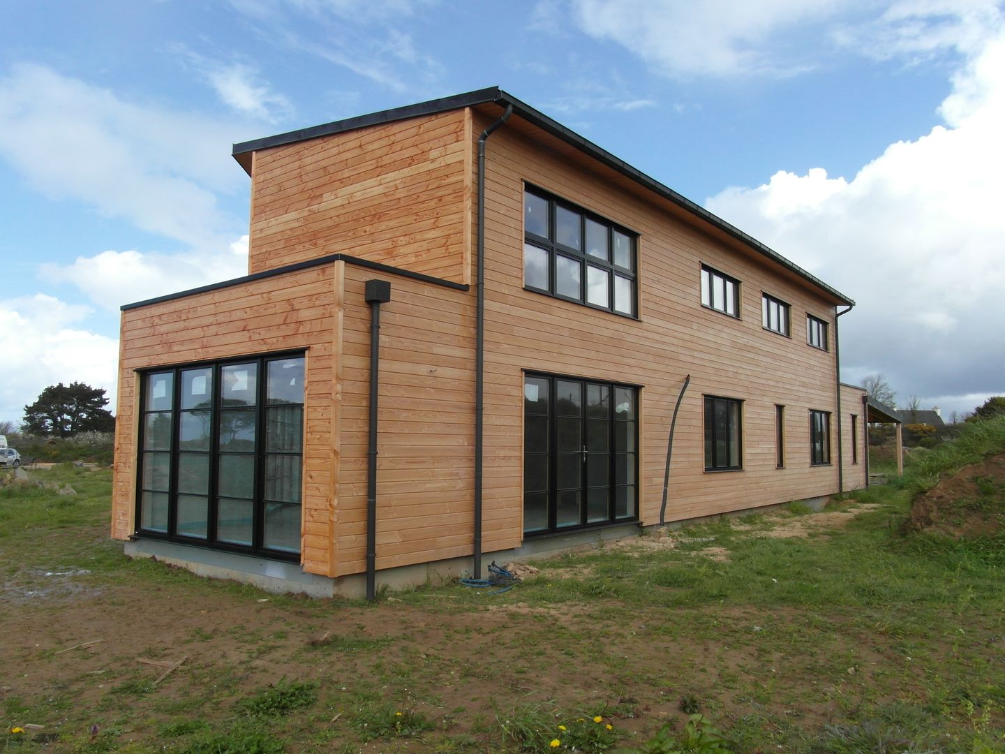 Quelques réalisations de maisons bioclimatiques dessinées ces dernières années, GUENNOC Soizic GUENNOC Soizic Modern houses