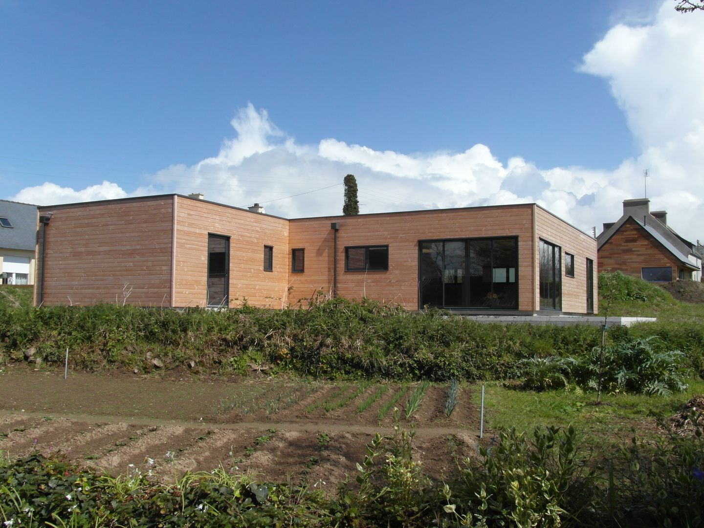 Quelques réalisations de maisons bioclimatiques dessinées ces dernières années, GUENNOC Soizic GUENNOC Soizic Casas de estilo moderno