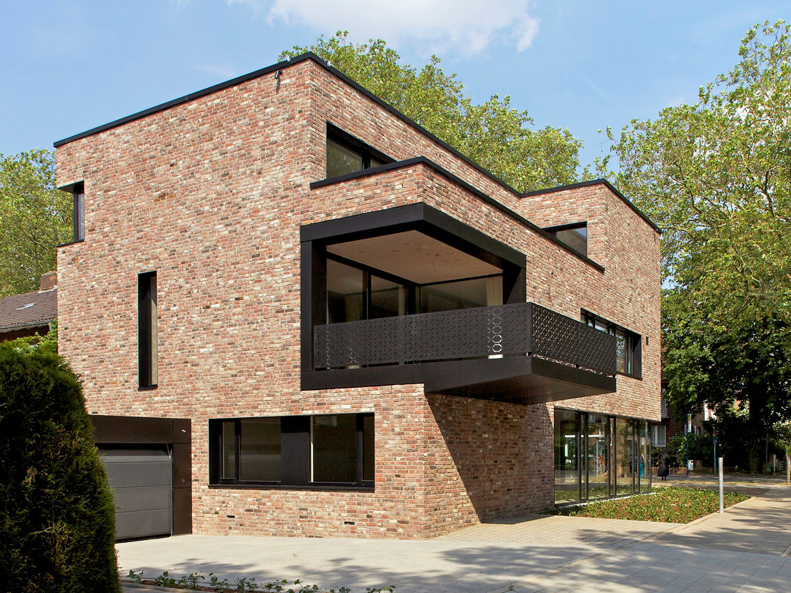 Außergewöhnlicher Kubus: Haus Strathmann Münster, Andreas Heupel Architekten BDA Andreas Heupel Architekten BDA บ้านและที่อยู่อาศัย