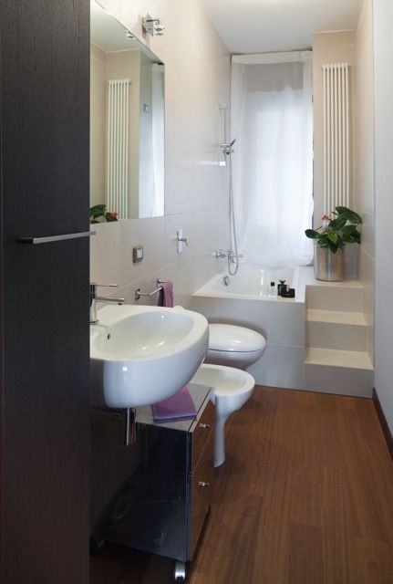 Casa Dp 2: La richiesta della committenza è quella di trasformare un appartamento bilocale di 62 mq , gk architetti (Carlo Andrea Gorelli+Keiko Kondo) gk architetti (Carlo Andrea Gorelli+Keiko Kondo) Modern bathroom