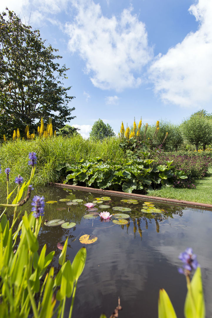 Klassieke villa tuin Waspik, De Rooy Hoveniers De Rooy Hoveniers Jardines rurales