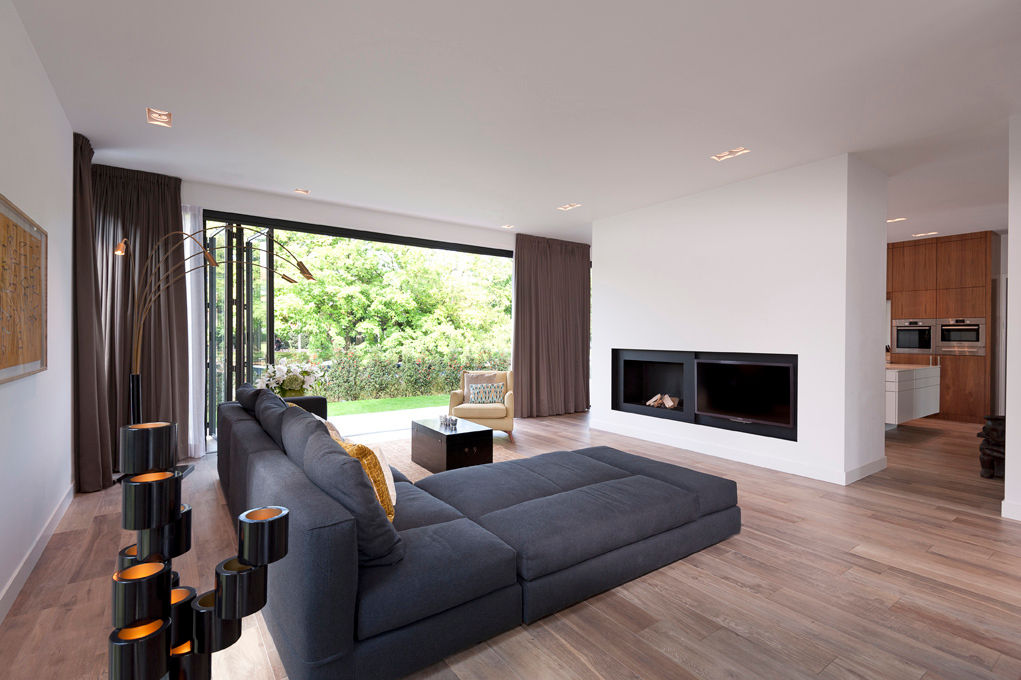 Villa Amsterdam Zuid, paul seuntjens architectuur en interieur paul seuntjens architectuur en interieur モダンデザインの リビング