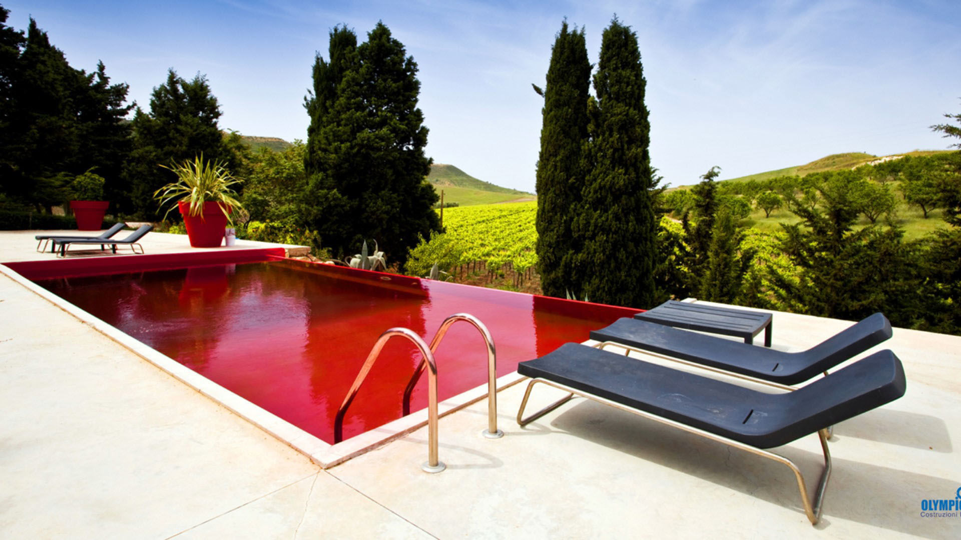 Realizzazione piscina pubblica per Hotel Farm Butera Olympic Italia Costruzioni Piscine SPA - di Gabriele Lodato Piscina in stile mediterraneo