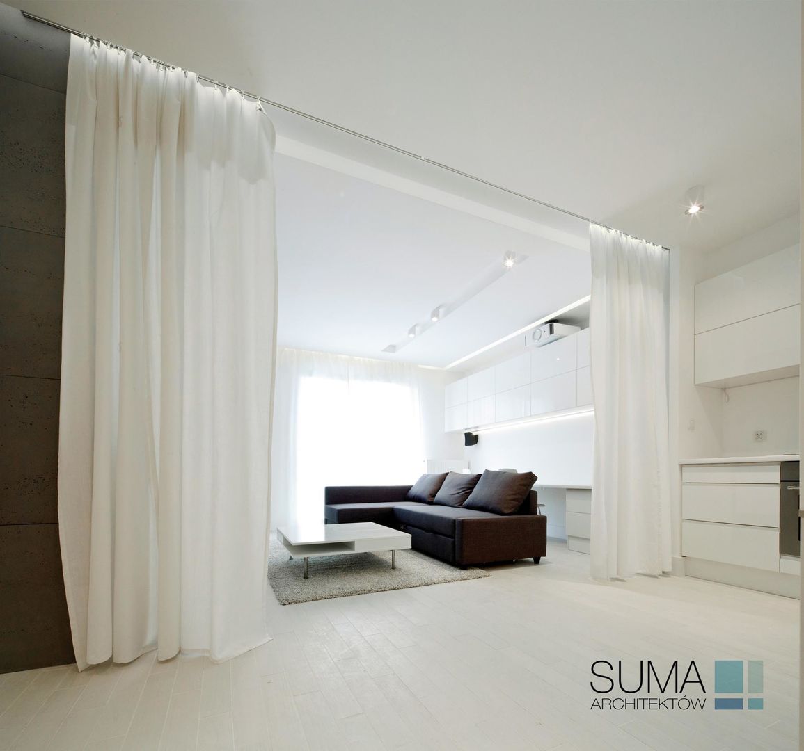 ​WHITE ONE SUMA Architektów Salas de estilo minimalista