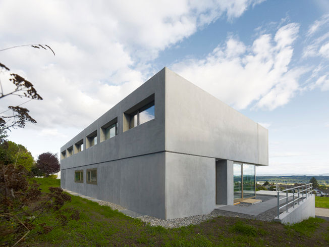 Doppelvilla am Jurasüdfuss, ern+ heinzl Architekten ern+ heinzl Architekten Minimalist house