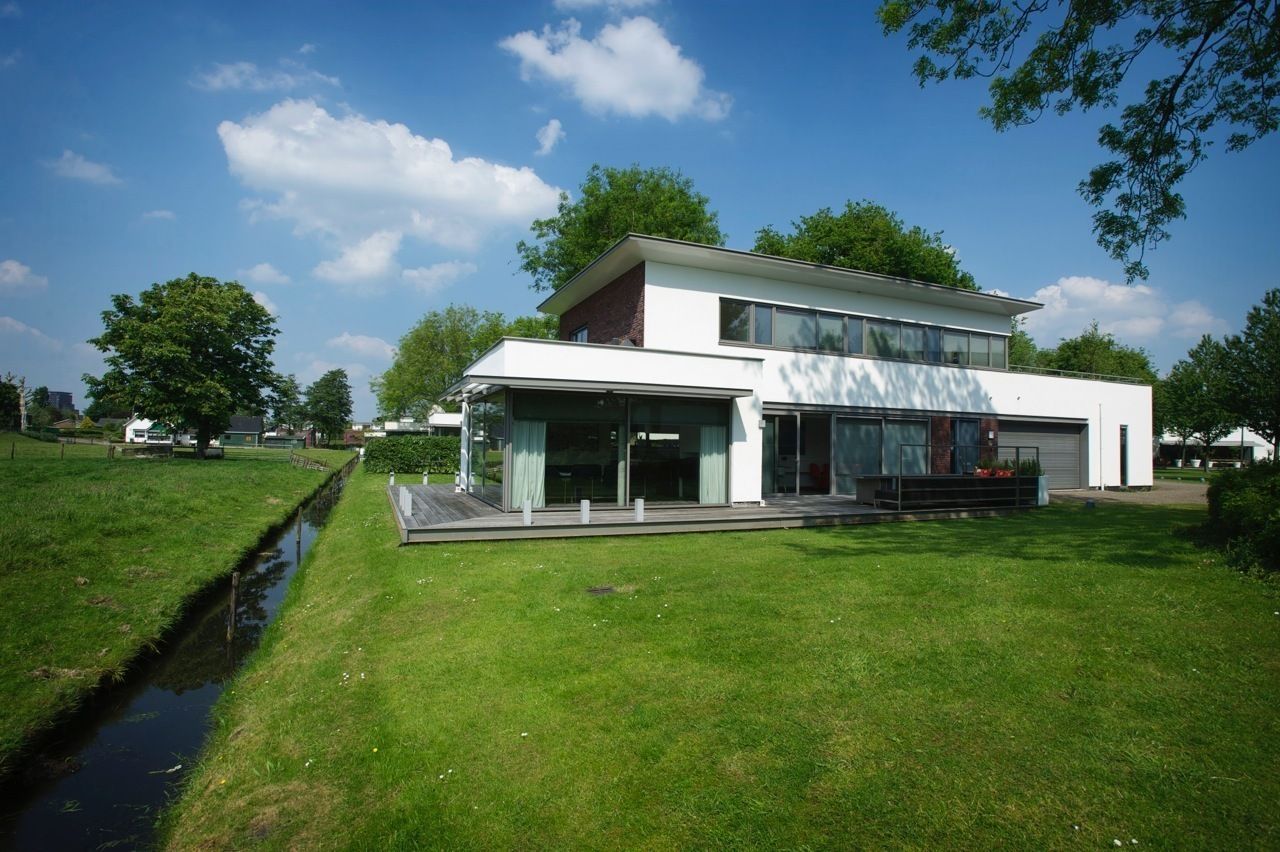 Woonhuis Nootdorp, Leonardus interieurarchitect Leonardus interieurarchitect Modern houses