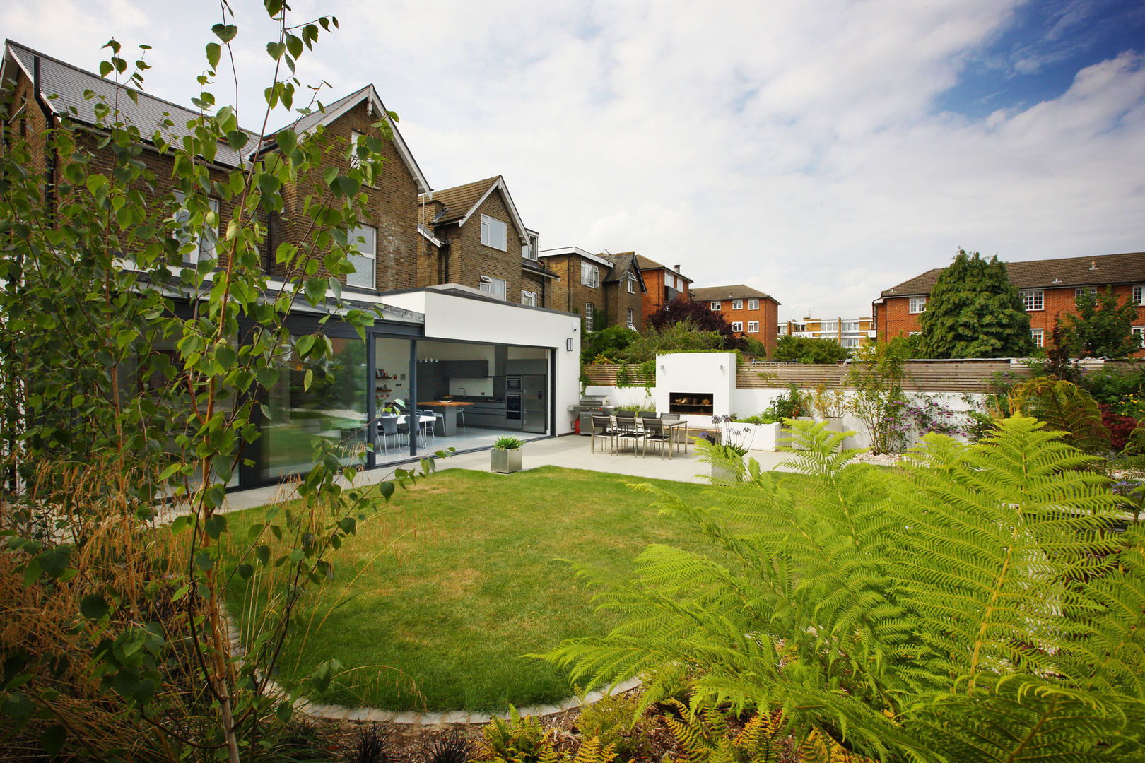 Overgrown shrub land transformed into a beautiful landscaped garden PAD ARCHITECTS