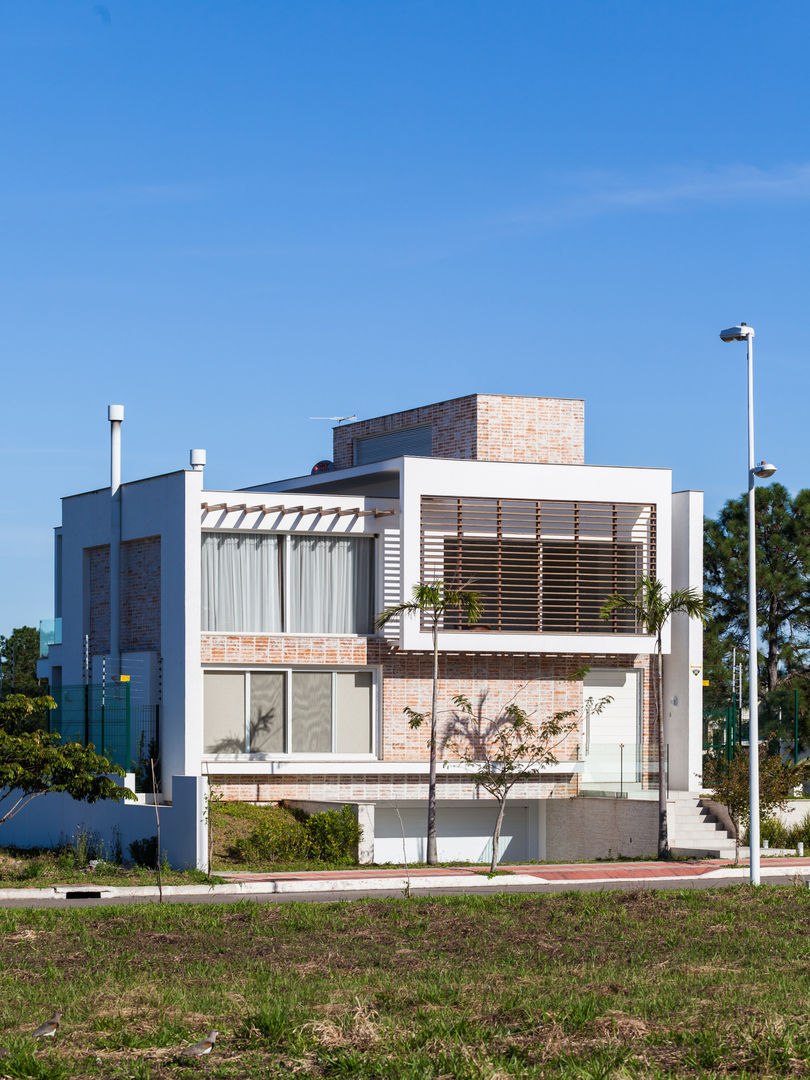 ​Residência Condomínio Marina Philippi, Mantovani e Rita Arquitetura Mantovani e Rita Arquitetura 모던스타일 주택