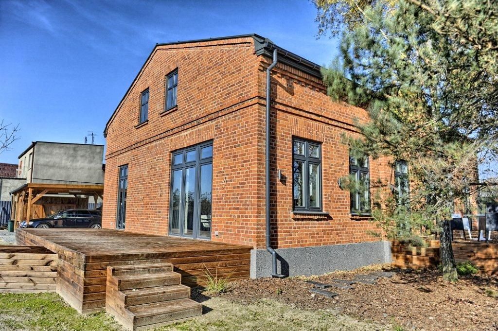 ksawery brick house, REFORM Konrad Grodziński REFORM Konrad Grodziński モダンな 家