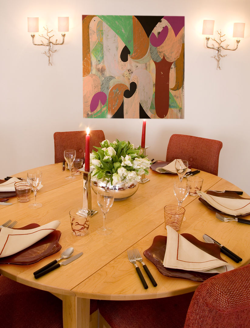 Dining Table and chairs, with contemporary painting behind. Meltons Dining room Tables