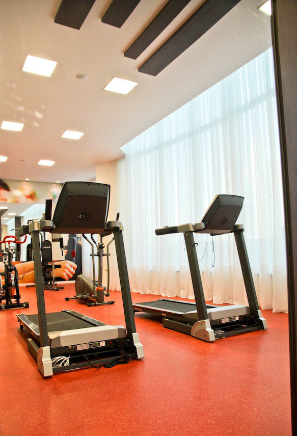 Empreendimento em Balneário Camboriú - Vila Malbec, Daniela Vieira Arquitetura Daniela Vieira Arquitetura Modern gym